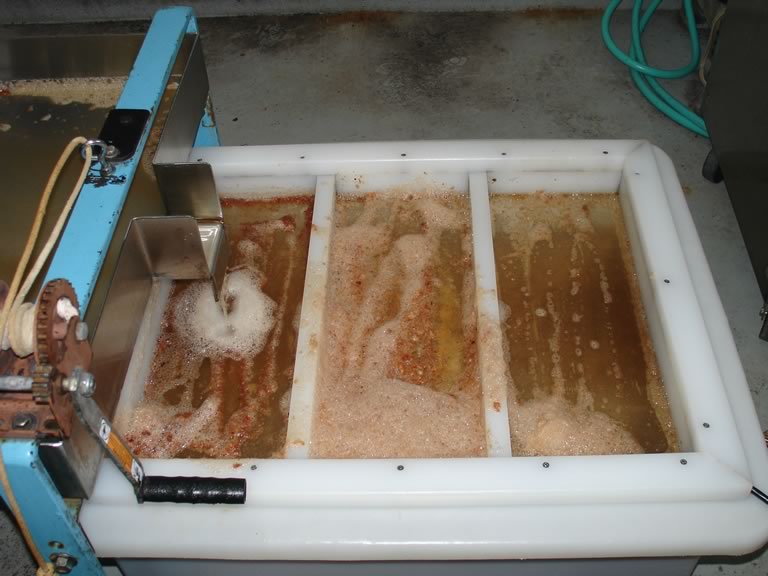 cider flowing out of the press